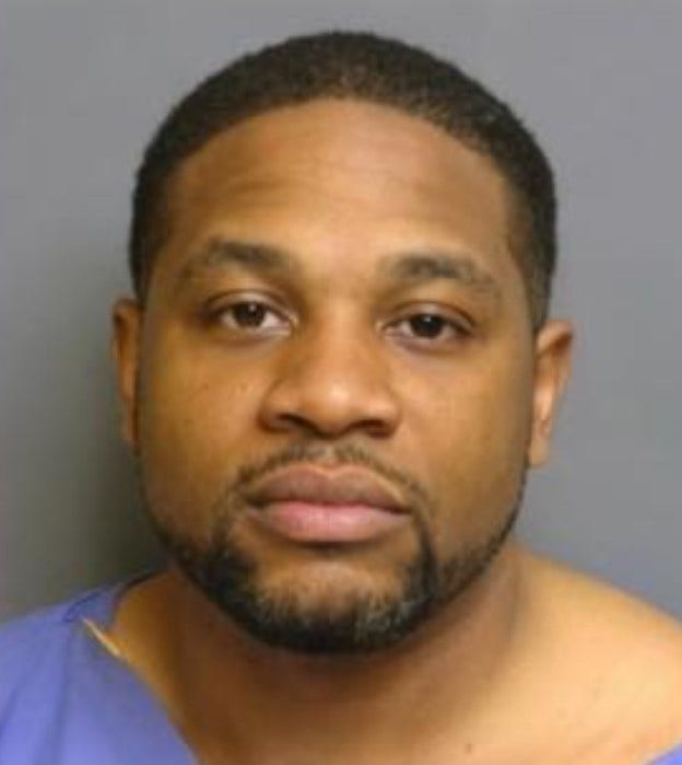 Man accused of robbing customers, employees at gunpoint inside Eastpointe business