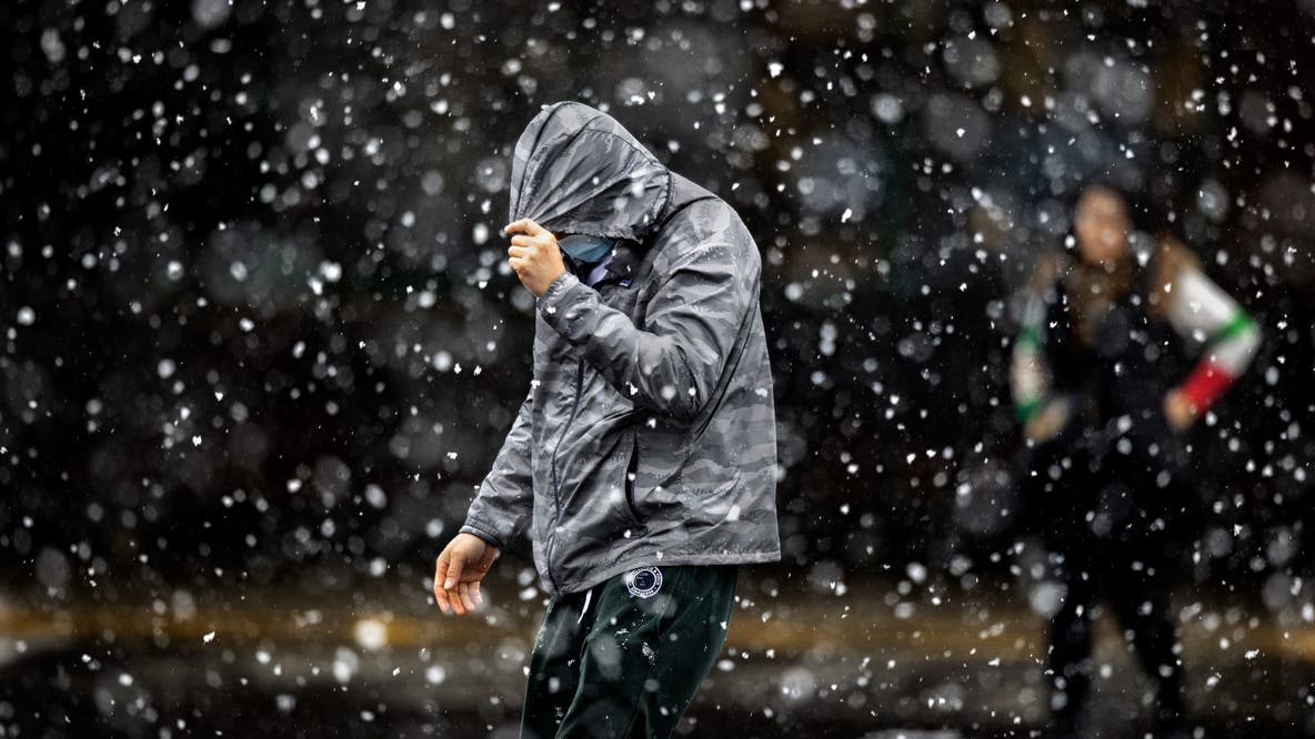 60 mph wind gusts, snow squalls, and falling temperatures - an active weather day in Michigan