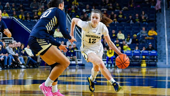 Swords and Solfilkanich score 17 points each as No. 6 Michigan beats Akron 85-59