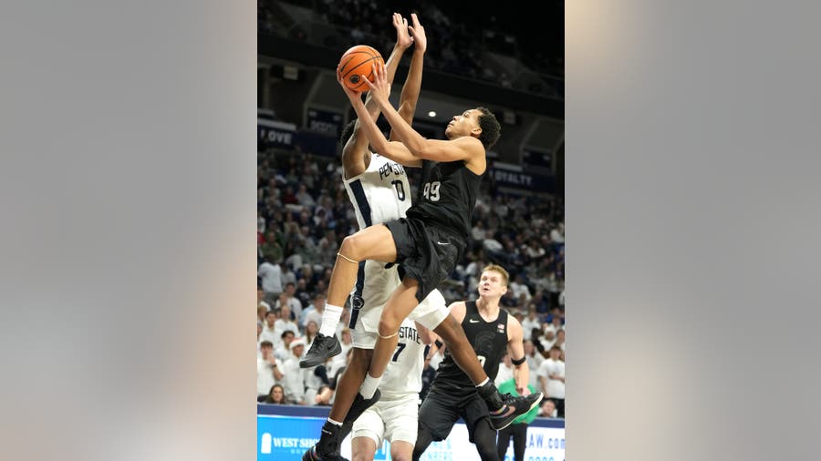 Ugochukwu scores career-high 23, leads No. 9 Michigan State over Penn State 76-72