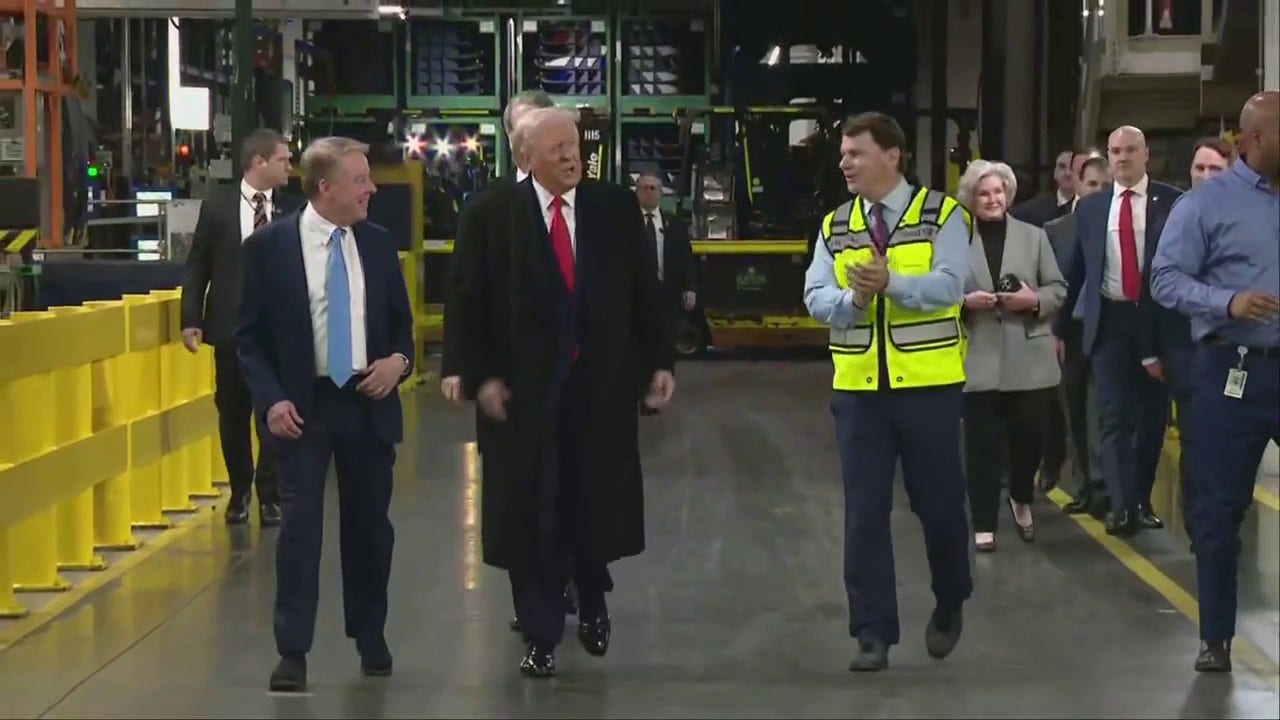 “We Want to Make Cars Here”: Trump Visits Ford Plant, Pushes US Manufacturing