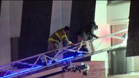 Firefighters rescue multiple residents from burning Southfield apartment