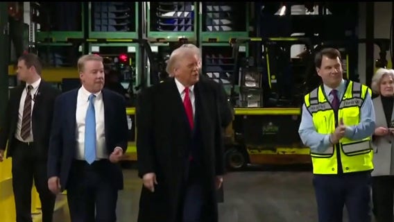 Experts weigh in on Ford autoworker suspension after incident with President Trump