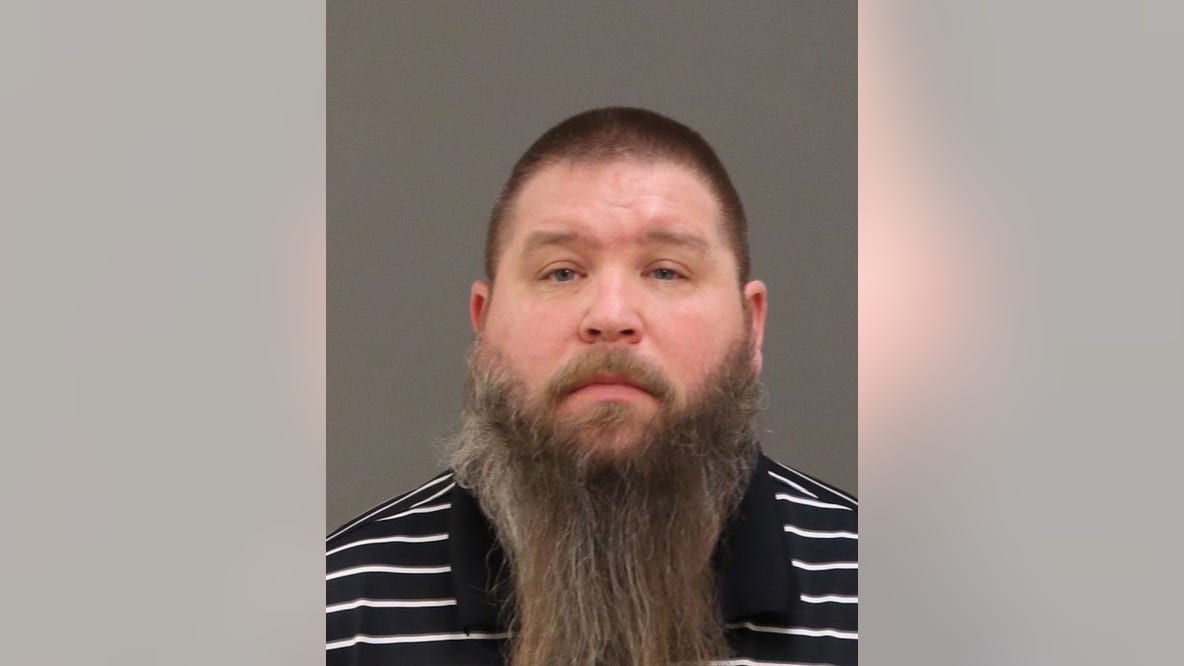 Michigan middle school wrestling coach suspended, charged after inappropriate messages to student