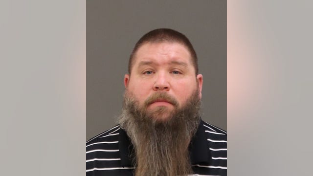 Michigan middle school wrestling coach suspended, charged after inappropriate messages to student