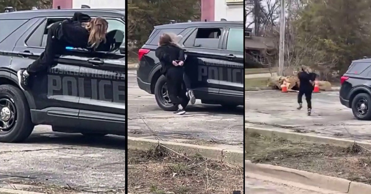 Handcuffed woman who squeezed out of window of Michigan police car caught days after escape Handcuffed woman who squeezed out of window of Michigan police car caught days after escape
