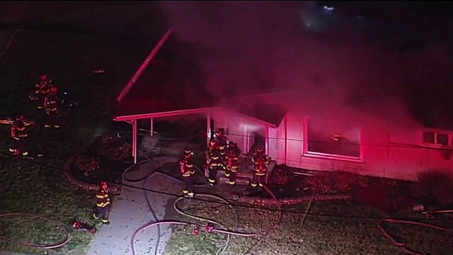Livonia firefighter not seriously injured after falling through floor while battling house fire
