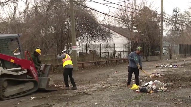 Crews work to clean up abandoned Detroit apartment that has become hot spot for illegal dumping