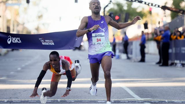 Michigan coach wins LA Marathon in dramatic fashion