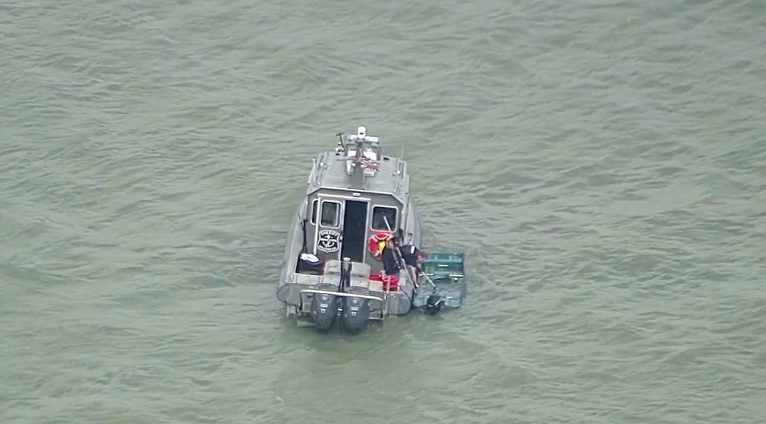 Three boaters rescued from capsized boat on Lake St. Clair
