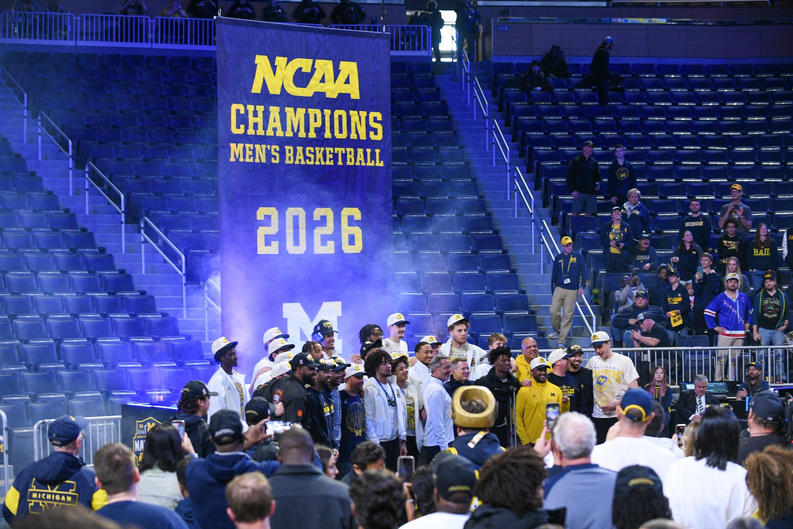 Thousands turn out to watch Michigan raise NCAA banner at Crisler Center