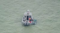 Three boaters rescued from capsized boat on Lake St. Clair