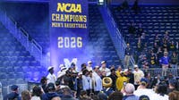Thousands turn out to watch Michigan raise NCAA banner at Crisler Center