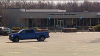 Livonia officer stabbed by knife-wielding suspect who entered lobby making threats