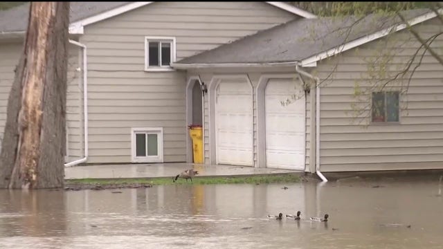 Utica residents dealing with flooding after severe overnight weather