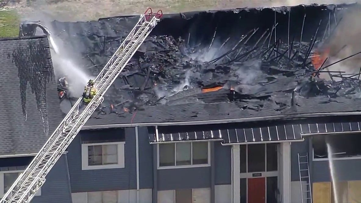 Plymouth apartment fire: Roof collapses as crews battle flames
