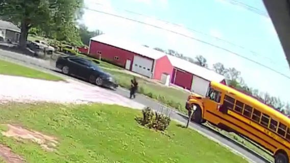 Milan student exiting school bus nearly hit by passing driver who ignored stop sign