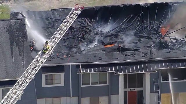 Plymouth apartment fire: Roof collapses as crews battle flames