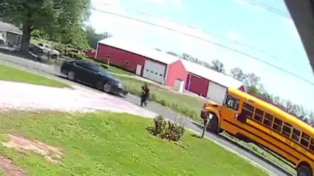 Milan student exiting school bus nearly hit by passing driver who ignored stop sign