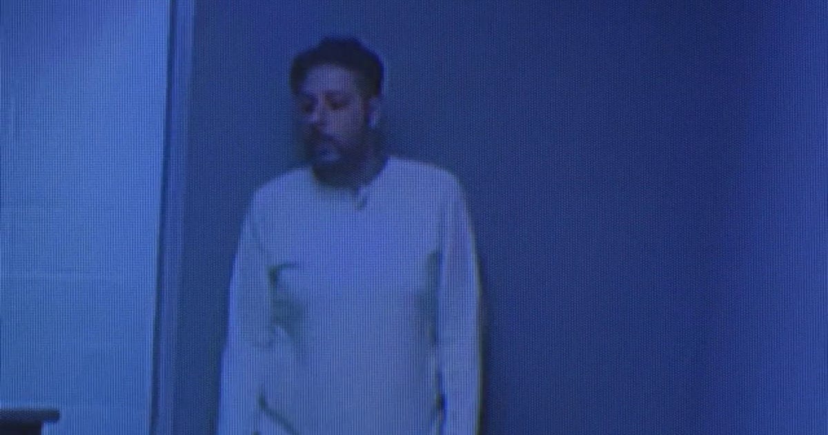 Hazmat suit-wearing Livonia man accused of attempted break-ins charged with assault