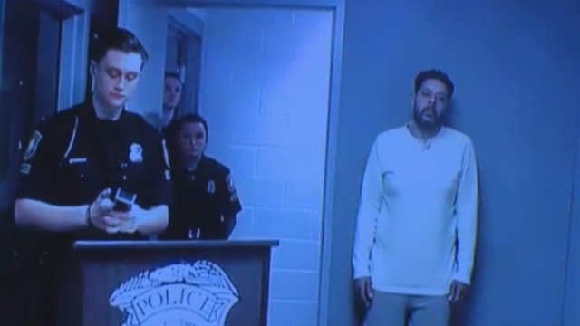 Hazmat suit-wearing Livonia man accused of attempted break-ins charged with assault