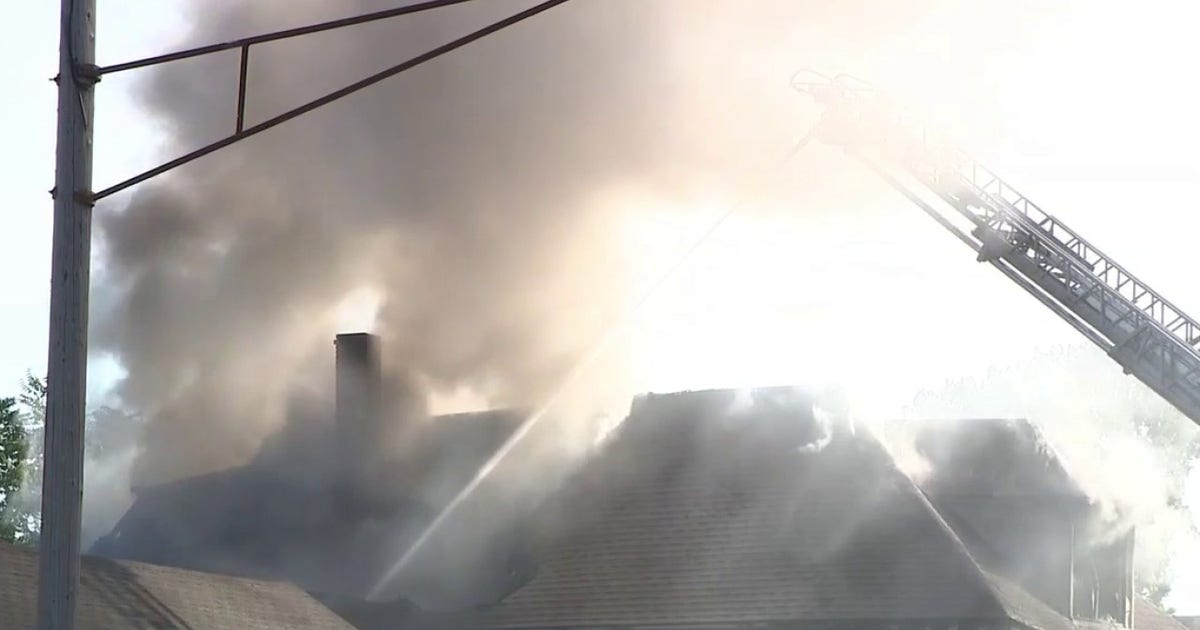 Hamtramck family jumps from burning home after blaze tears through house
