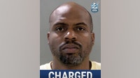Driver charged in crash killing woman, injuring husband after speeding through stop sign