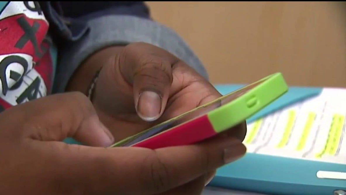 Birmingham parents split over schools' bell-to-bell cellphone ban