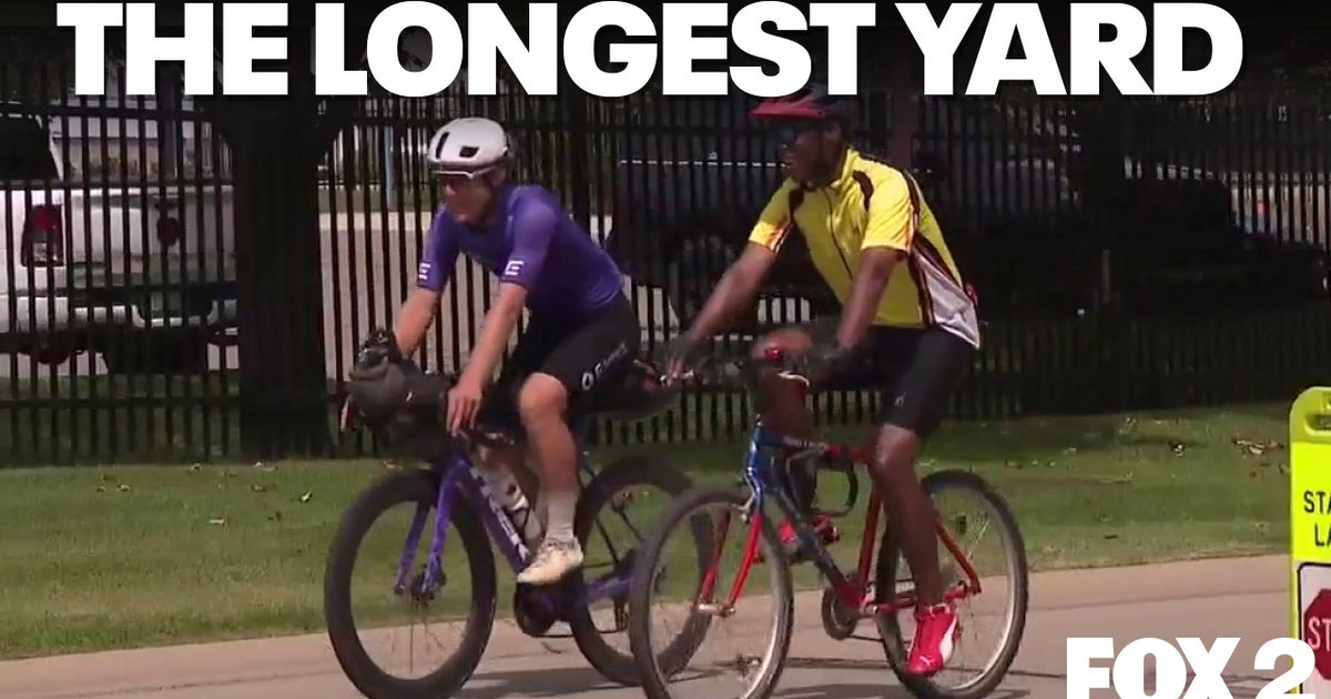 Cyclist's 11,000 mile journey passes through Lions training camp with Super Bowl ball