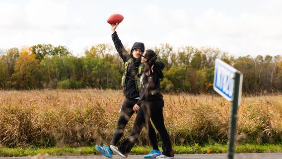 Lions fan runs from Green Bay to Detroit with game ball in honor of wife's cancer journey