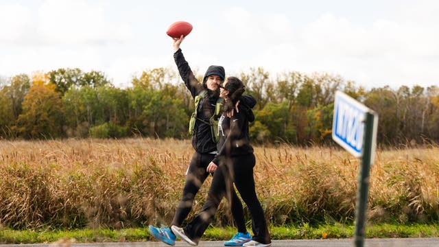 Lions fan runs from Green Bay to Detroit with game ball in honor of wife's cancer journey
