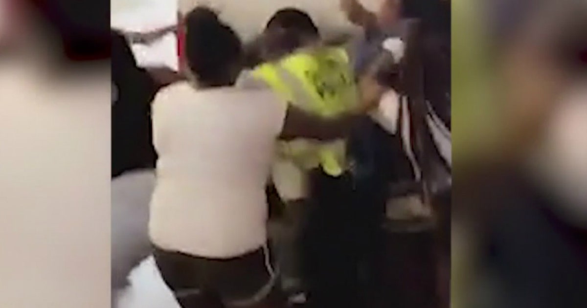 Video shows CPD officer caught in middle of fight during Pride ...