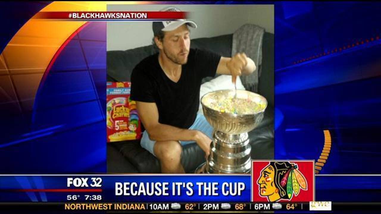 Chicago Blackhawk Andrew Desjardins eats Lucky Charms from the Stanley Cup.  : r/sports