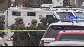 Woman found shot dead after South Side SWAT standoff; man arrested