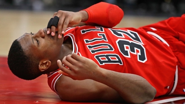Bulls' Kris Dunn in concussion protocol, out indefinitely