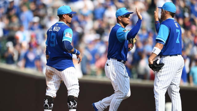 Hendricks shuts down Reds, Cubs win 9-0 to complete sweep