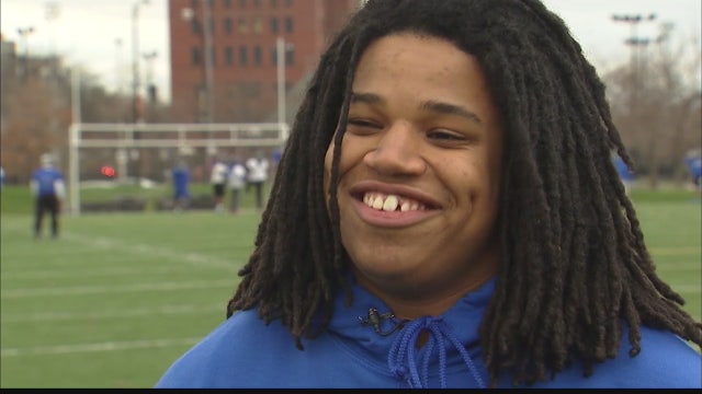 Local high school football team turning boys into men