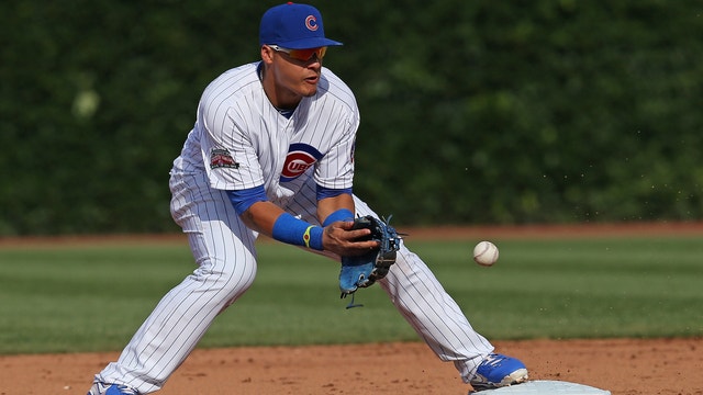Báez, Cubs come out swinging, beat Brewers 6-2