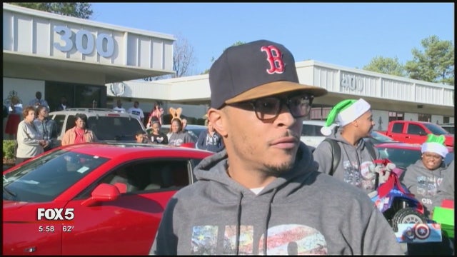 T.I. visits CHOA, passes out presents to sick children