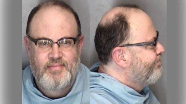 Illinois professor on paid leave amid accusations of filming students in bathroom