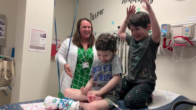 Hospital staff celebrate 5-year-old boy's cancer remission with confetti