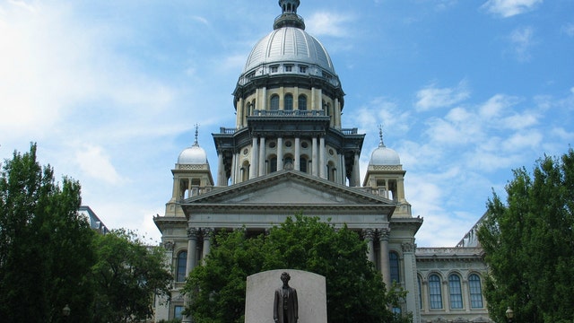 Mask melee in Illinois House sparks profanity, protests, penalties — and an apology
