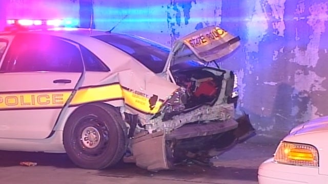 Car slams into squad vehicle during traffic stop on Kennedy