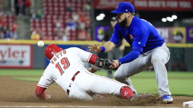 Yasiel Puig singles in 10th as Reds rally past Cubs 6-5