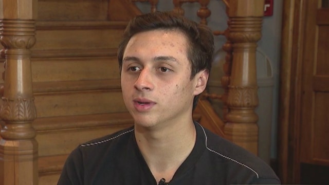 Chicago police attend high school graduation for fallen officer's son