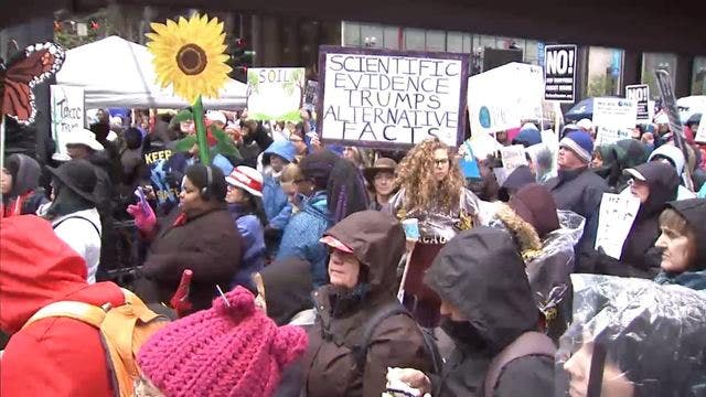 Thousands brave weather to protest Trump climate policies