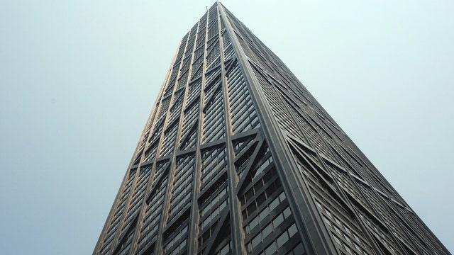 Chunk of aluminum falls from building once known as the John Hancock