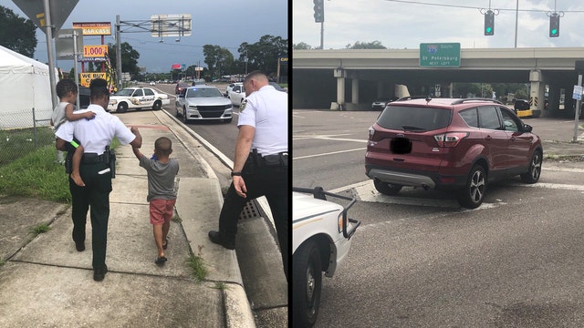 Authorities find 2 children in car with passed out adults in front seats