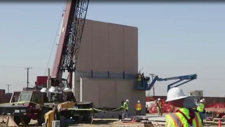 One of the prototype border walls being built in San Diego.