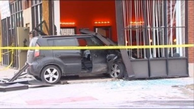 00cd90ee-SUV crashes into barbershop